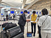 Korean nationals prepare to board the first chartered evacuation flight from the United Arab Emirates to Incheon on March 8. [MINISTRY OF FOREIGN AFFAIRS]