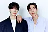 Shownu X Hyungwon, a subunit duo of boy band Monsta X, poses for photos after a roundtable interview with journalists at Starship Entertainment's headquarters in southern Seoul on May 19. [STARSHIP ENTERTAINMENT]