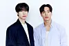 Shownu X Hyungwon, a subunit duo of boy band Monsta X, poses for photos after a group interview with journalists at Starship Entertainment's headquarters in southern Seoul on May 19. [STARSHIP ENTERTAINMENT]