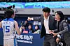 Asan Woori Bank Woori Won head coach Wi Sung-woo, center, and coach Chun Joo-weon, right, speak to a player during a WKBL game. [WOMEN'S KOREAN BASKETBALL LEAGUE]