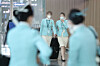 Korean Air flight attendants are seen walking at Incheon International Airport on Feb. 26, 2020. [NEWS1]