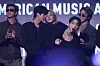Boy band BTS accepts the Artist of the Year Award on stage during the American Music Awards at the MGM Grand Garden Arena in Las Vegas, Nevada, on May 25. [AFP/YONHAP]