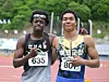 Runners Joel Jin Nwamadi, right, and Biwesa Daniel Kashama pose after their 100-meter semifinal race in Jeongseon County, Gangwon, on May 11. [YONHAP]