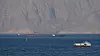 Ships and tankers in the Strait of Hormuz off the coast of Musandam, Oman, April 18, 2026. [REUTERS/YONHAP]