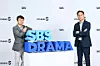 Studio S chief Hong Seong-chang, left, and SBS programming director Kim Gi-seuk pose for a photo at SBS's media event at the Hotel Naru Seoul in Mapo District, western Seoul, on June 1. [SBS]