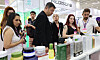 Visitors look around makeup and cosmetic products at a fair at Coex in Gangnam District, southern Seoul, on May 29, 2024.[YONHAP]