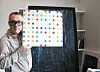Artist Damien Hirst holds his work during an interview with the JoongAng Ilbo in London in 2008. [JOONGANG ILBO]