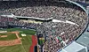 Fans cheer during a KBO Opening Day game between the KT Wiz and LG Twins at Jamsil Baseball Stadium in Songpa District, southern Seoul, on March 28. [NEWS1]