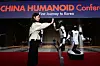 A model interacts with China's Unitree G1 humanoid robot at an expo held at COEX in Seoul on April 4. [YONHAP]