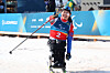 Kim Yun-ji celebrates after winning silver with a time of 33:10.1 in the para cross-country skiing women's sprint sitting medal final at the 2026 Milan-Cortina Winter Paralympics at the Tesero Cross-Country Skiing Stadium in Italy on March 10. [KOREA PARALYMPIC COMMITTEE]