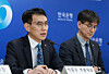 Park Jong-woo, left, deputy governor of the Bank of Korea, speaks at a press briefing on the Monetary Policy Report at the central bank in Jung District, central Seoul, on March 12. [BANK OF KOREA]