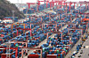 Containers are stacked at a port in the southeastern city of Busan on March 31. [YONHAP]