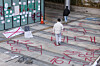 People walk across the Dongduk Women's University campus, which had been spray painted in protest of the school's efforts to become a coeducational institution, on Nov. 24, 2024. [YONHAP]