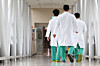 Doctors walk down a corridor inside a hospital in Seoul on May 1. [YONHAP]