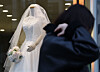 A pedestrian walks by a wedding dress shop in Ahyeon-dong, western Seoul, on March 19, 2024. [YONHAP]