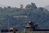 A North Korean soldier stands guard at his guard post inside North Korean territory, in this picture taken from Paju, South Korea, near the demilitarized zone separating the two Koreas, on June 17, 2020. [REUTERS/YONHAP]