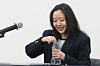 Min Hee-jin opens a water bottle during a press conference held in central Seoul in February. [NEWS1]