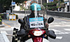 A delivery worker rides a motorcycle on a street in Seoul on Nov. 10. [NEWS1]