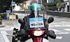A delivery worker rides a motorcycle on a street in Seoul on Nov. 10. [NEWS1]