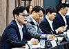 Industry Minister Kim Jung-kwan, left, presides over the first subcommittee meeting on AI transformation across the country's industrial complexes in the administrative capital of Sejong on April 17 in this photo provided by the ministry. [YONHAP]