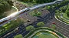 Concept art for the island’s future transport network, including a light rail system cutting through the roundabouts [SUN GROUP]