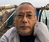 Chinese dissident Dong Guangping is pictured on a boat off the coast of Taean County, South Chungcheong. [SCREEN CAPTURE]