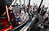 Members of Korea's official Star Wars fan club, the 501st Legion Korea Garrison, ascend an escalator during an event at Seoul Sky in Lotte World Tower in Songpa District, southern Seoul, on May 4. Seoul Sky, the observation deck of Lotte World Tower, is hosting the Star Wars-themed event through June 28. [NEWS1]