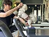 Mary, a Pekingese, works on strengthening her leg muscles on a reformer. [WOO JI-WON]
