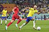 Richarlison, right, vies with Son Heung-min during a round of 16 match at the 2022 FIFA World Cup at Stadium 974 in Doha, Qatar, on Dec. 5, 2022. [XINHUA/YONHAP]