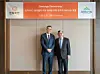 Hanwha Vision Vice President Kim Dong-seon, left, and Feng-Ming Wang, CEO of Ambarella, pose for a photo after the companies' strategic partnership signing ceremony held in Seoul on March 20. [HANWHA VISION]
