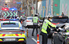 Police conduct drunk driving tests outside Yanggang Elementary School in Yangcheon District, western Seoul, on March 4. [YONHAP]