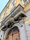Home in Trieste built with vinegar instead of water in the mortar — above the door is a sculpture of three eagles tearing apart a snake, symbolizing the defeat of the French emperor Napoleon by Russia, Prussia and Austria [JOEL DOWN]