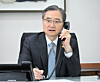 Minister of Foreign Affairs Cho Hyun speaks on a telephone in this file photo released by the ministry. [MINISTRY OF FOREIGN AFFAIRS]