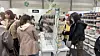 Visitors browse merchandise featuring Buddhist motifs at a booth at the 2026 Seoul International Buddhism Expo. [WOO JI-WON]