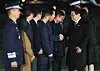 President Lee Jae Myung, right, shakes hands with Rep. Jung Chung-rae, third from right, leader of the ruling Democratic Party, upon his arrival at Seoul Air Base in Seongnam, south of Seoul, on March 4, 2026, after returning from his trip to Singapore and the Philippines. [YONHAP]