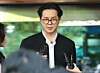 Song Min-ho, member of K-pop boy band Winner, leaves the Seoul Western District Court in Mapo District, western Seoul, on April 21. [NEWS1]