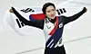 Short track speed skater Kim Gil-li celebrates after winning gold in the women's 1,500-meter final of the 2026 Milan-Cortina Winter Olympics in Milan on Feb. 20. [EPA/YONHAP]