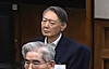 Former President Yoon Suk Yeol listens to a judge delivering his sentence during a first-instance verdict hearing at the Seoul Central District Court in Seocho District, southern Seoul, on Feb. 19. The court sentenced him to life in prison for leading an insurrection through his imposition of martial law on Dec. 3, 2024. [SEOUL CENTRAL DISTRICT COURT]