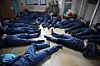 Members of the legal press corps wear inmate uniforms and take part in a firsthand simulation of an inmate’s daily routine during an inspection at Anyang Prison in Gyeonggi, on April 15. [MINISTRY OF JUSTICE]