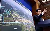 Lee Kyu-yeon, senior presidential secretary for public relations, shows a plan during a press briefing announcing the bid to develop a site for a presidential branch office in the administrative city of Sejong at the Blue House in central Seoul on April 14. [JOINT PRESS CORPS]
