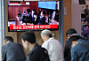 The Seoul High Court's ruling in former first lady Kim Keon Hee's trial on bribery and stock manipulation charges is televised at Seoul Station on April 28. [YONHAP]