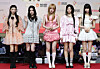 Girl group ILLIT poses at an event in Incheon on Dec. 25, 2025. [NEWS1]