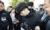 Jang Yun-gi, who is accused of killing a teenage high school student he did not know in downtown Gwangju, is transferred to prosecutors from Gwangju Seobu Police Precinct on May 14. [NEWS1]