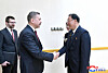 Ri Won-jong, head of the North's General Federation of Trade Unions of Korea, left, and Sergei Chernogayev, head of the Federation of Independent Trade Unions of Russia, shake hands in a photo released by the North's state news agency, Korean Central News Agency, on April 15. [YONHAP]