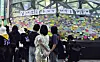 Citizens post memorial messages at Exit 10 of Gangnam Station in southern Seoul on May 17 during an event marking the 10th anniversary of the Gangnam Station murder case. [NEWS1]