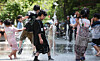 Children play by water fountains in Jongno District, central Seoul, on May 10. [NEWS1]