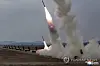 North Korea carries out a firepower strike drill involving 600-millimeter ultra-precision multiple rocket launchers on March 14, 2026, in this photo published by the Korean Central News Agency the following day. [YONHAP]