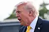 President Donald Trump speaks to journalists before boarding Air Force One at Palm Beach International Airport on May 2 in Palm Beach, Florida. [GETTY IMAGES/YONHAP]