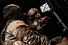 Soldiers with the U.S. 1st Battalion, 82nd Artillery Regiment, 1st Cavalry Division communicate through radio during live fire training on April 29 in Fort Hood, Texas. [GETTY IMAGES/YONHAP]