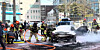Firefighters extinguish a blaze in a vehicle in Gayang-dong, Gangseo District, western Seoul, on March 8 after a Porsche sedan crossed the center line and collided with one vehicle before suddenly accelerating and crashing head-on into two more vehicles in succession. [NEWS1]